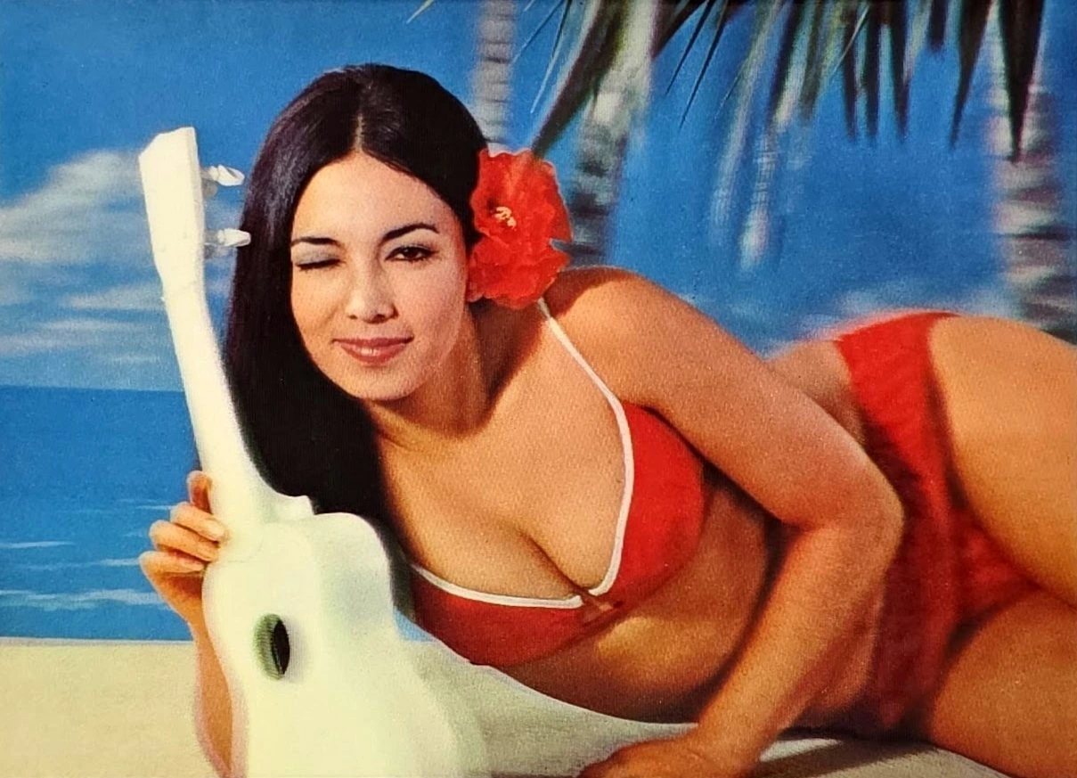 3D lenticular postcard with a winking woman
