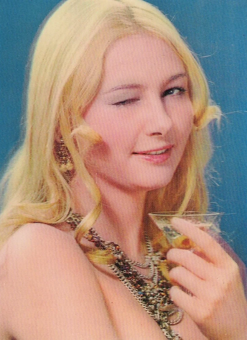 3D postcard featuring a winking woman.